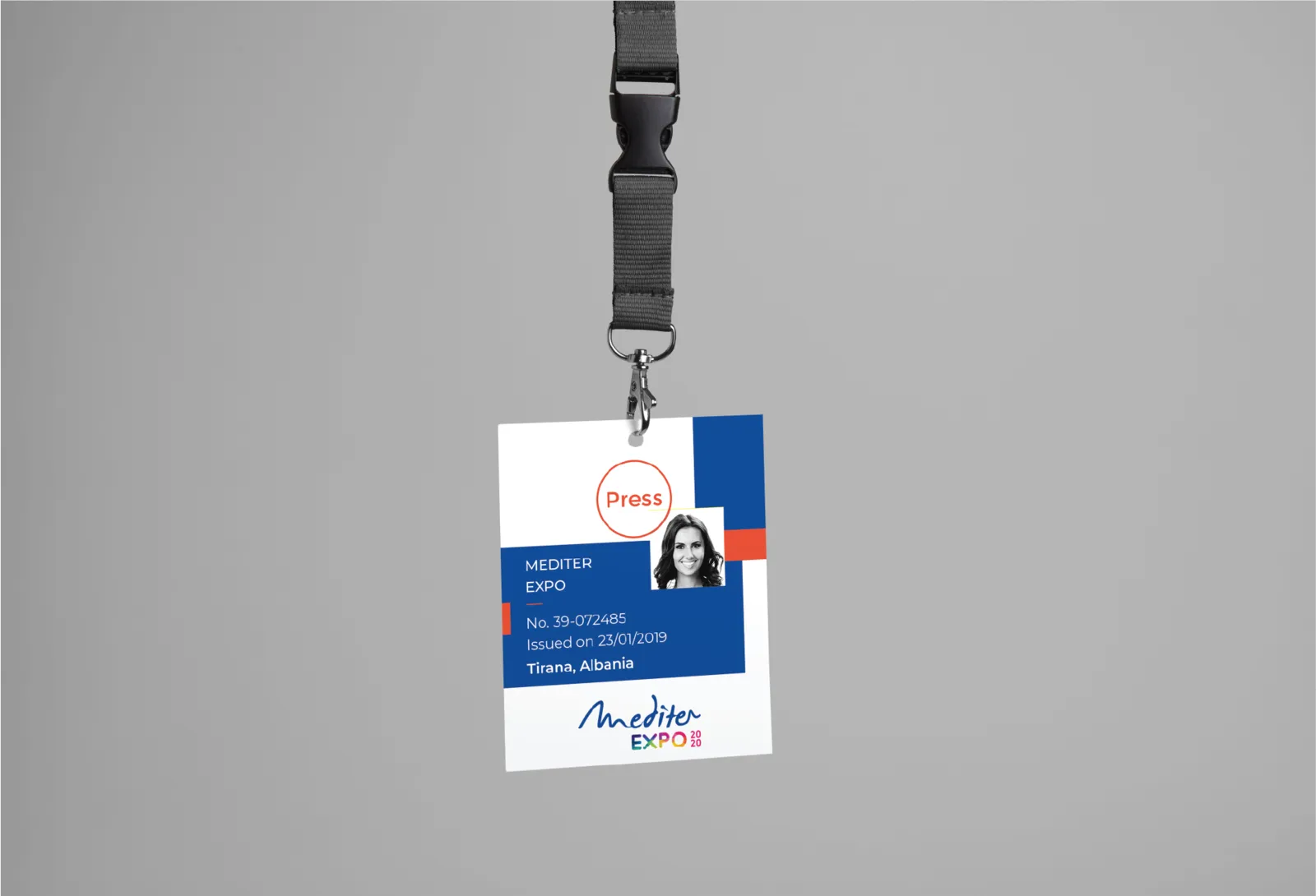 A Mediter Expo press badge on a lanyard