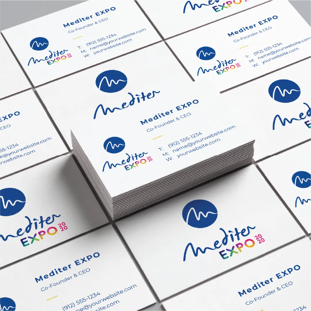 Stacks of Mediter Expo business cards